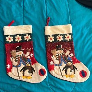 Snowman in penguin Christmas stockings